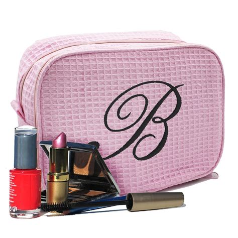 monogram makeup travel bags.